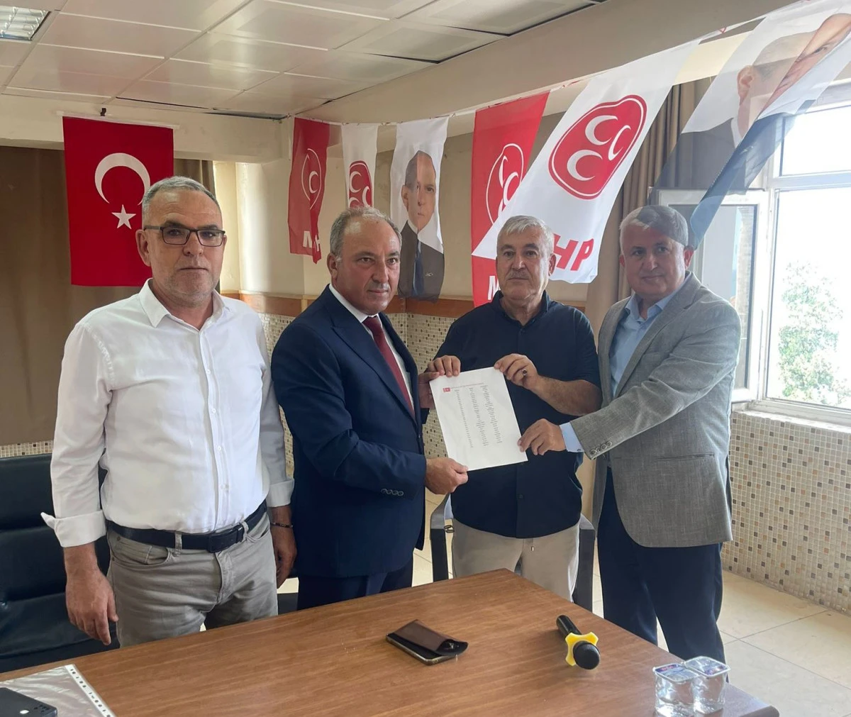 MHP Yumurtalık İlçe Teşkilatında Bayrak değişimi... 